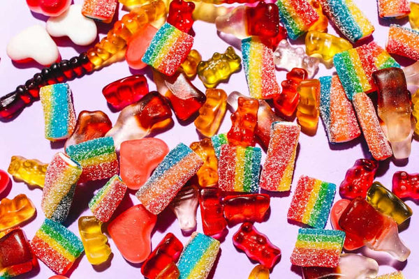 red, orange and yellow CBD gummy sweets. are cbd gummies safe to take?